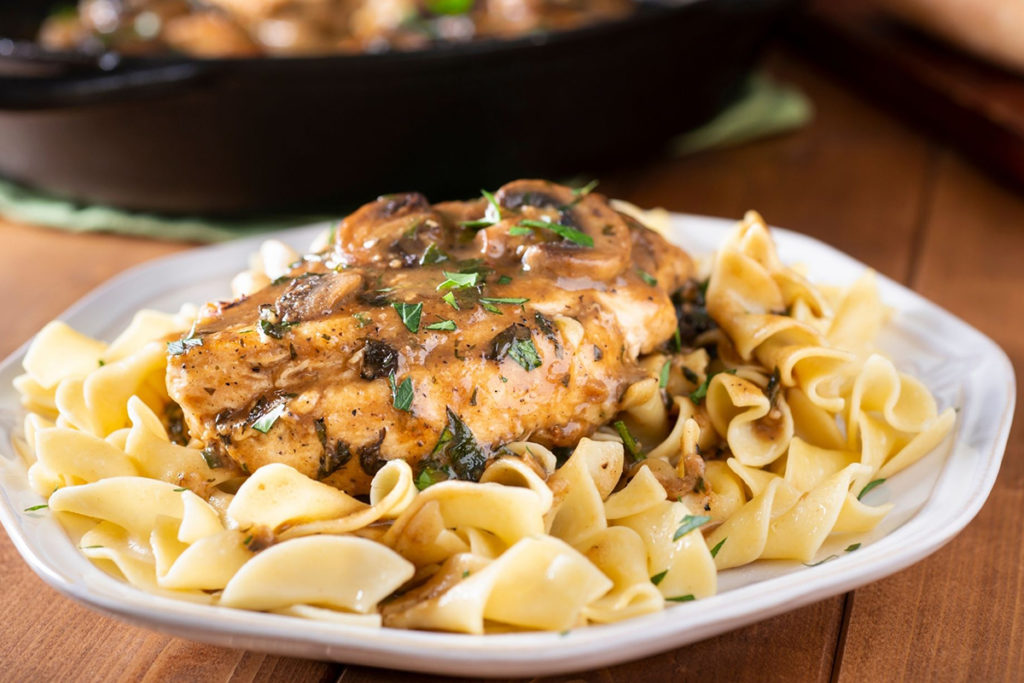 Noodles served with Chicken Marsala